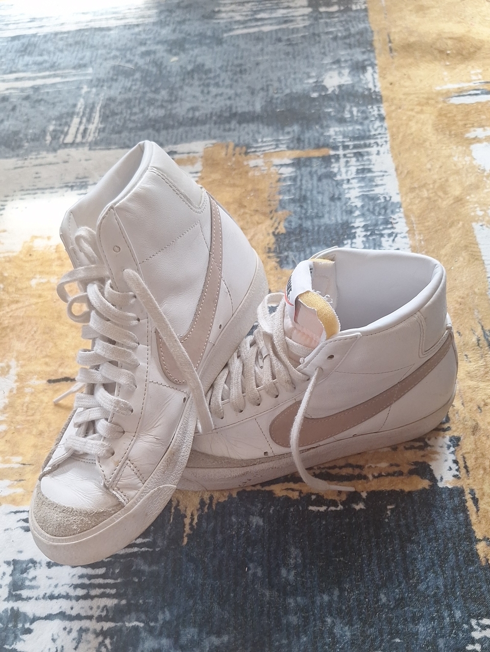 Nike Women's White High-Top Sneakers with Beige Swoosh